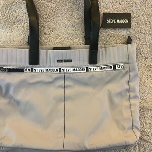 Awesome carry-all, go everywhere satchel-silver parachute material, black trim.